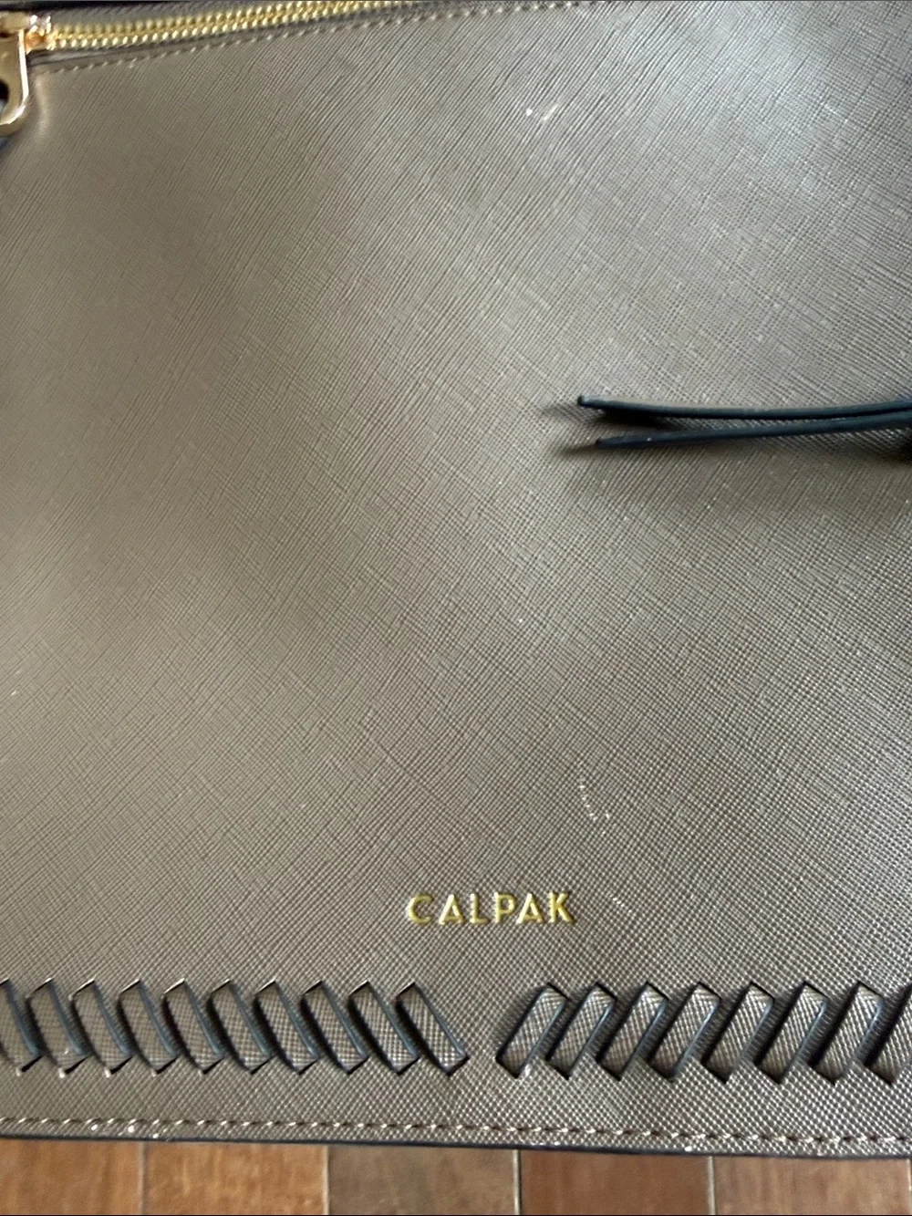 Calpak Brown Leather Backpack with Whipstitch Trim and Gold Hardware